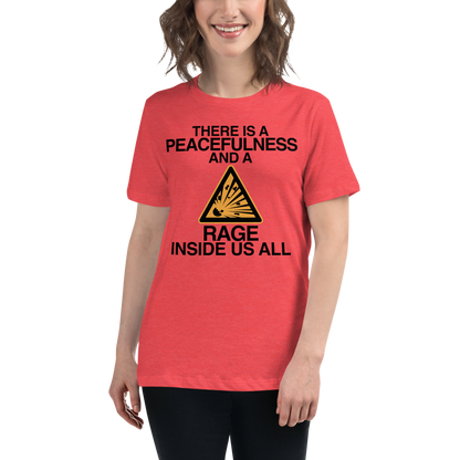 "There is a peacefulness and a rage inside us all" printed on a heather red women's relaxed t-shirt worn by a female