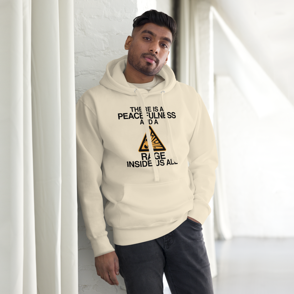 "There is a peacefulness and a rage inside us all" printed on a bone unisex hoodie worn by a male
