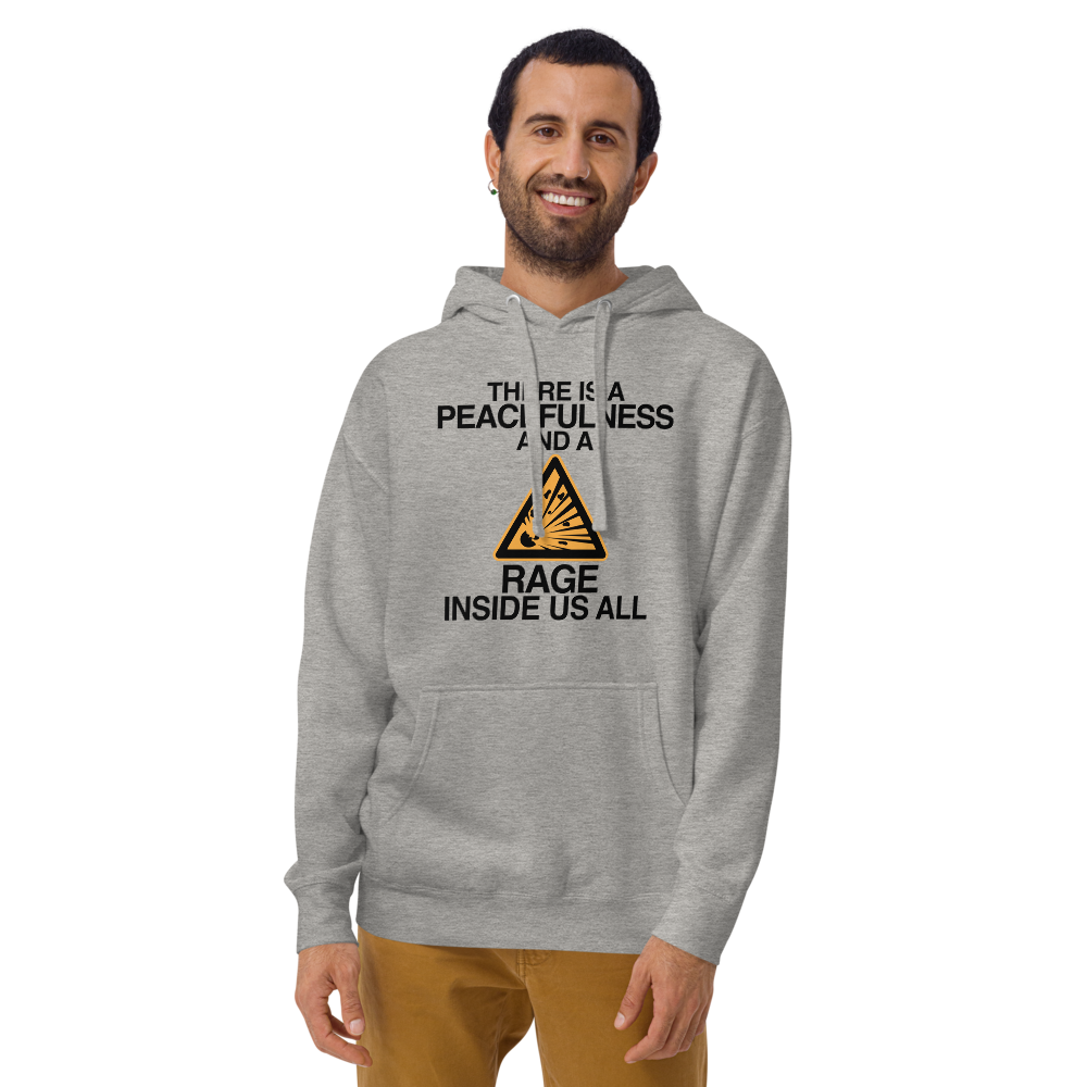 "There is a peacefulness and a rage inside us all" printed on a carbon grey warn by a male