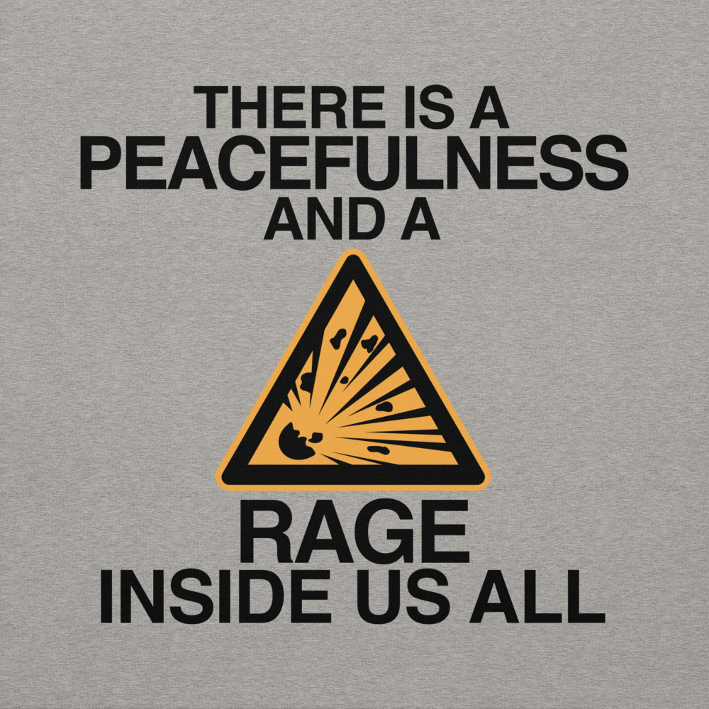"There is a peacefulness and a rage inside us all" printed on a carbon grey background