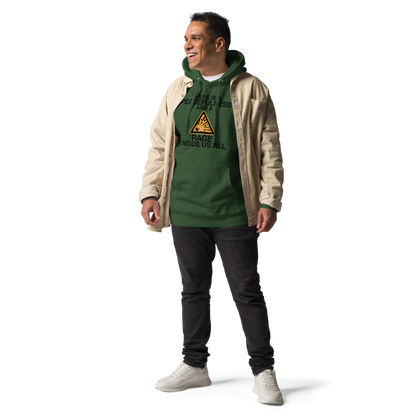 "There is a peacefulness and a rage inside us all" printed on a forest green unisex hoodie worn by a male with a jacket on top