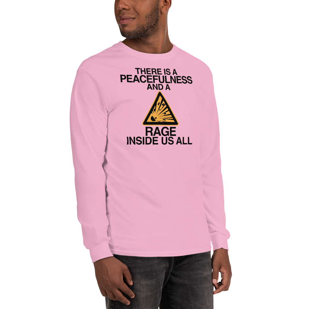 "There is a peacefulness and a rage inside us all" printed on a light pink men's long sleeve shirt worn by a male