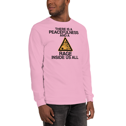 "There is a peacefulness and a rage inside us all" printed on a light pink men's long sleeve shirt worn by a male