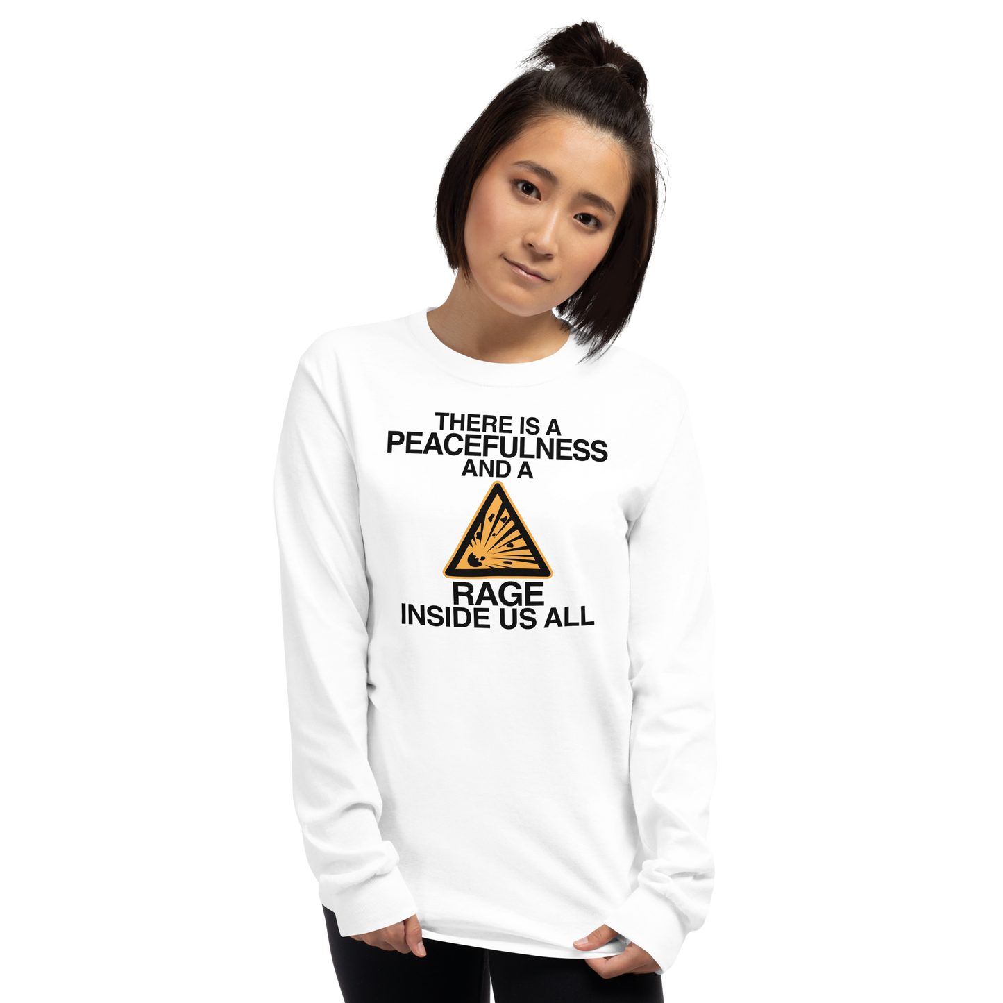 "There is a peacefulness and a rage inside us all" printed on a white men's long sleeve shirt worn by a female