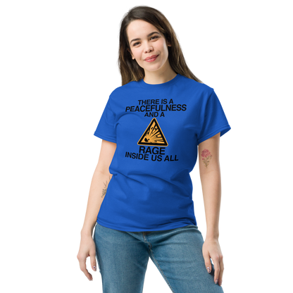 "There is a peacefulness and a rage inside us all" printed on a royal unisex classic tee worn by a female
