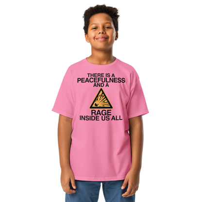 "There is a peacefulness and a rage inside us all" printed on a azalea youth classic tee worn by a male