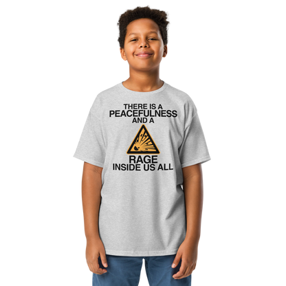 "There is a peacefulness and a rage inside us all" printed on a sport grey youth classic tee worn by a male