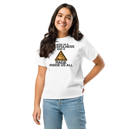 "There is a peacefulness and a rage inside us all" printed on a white youth classic tee worn by a female