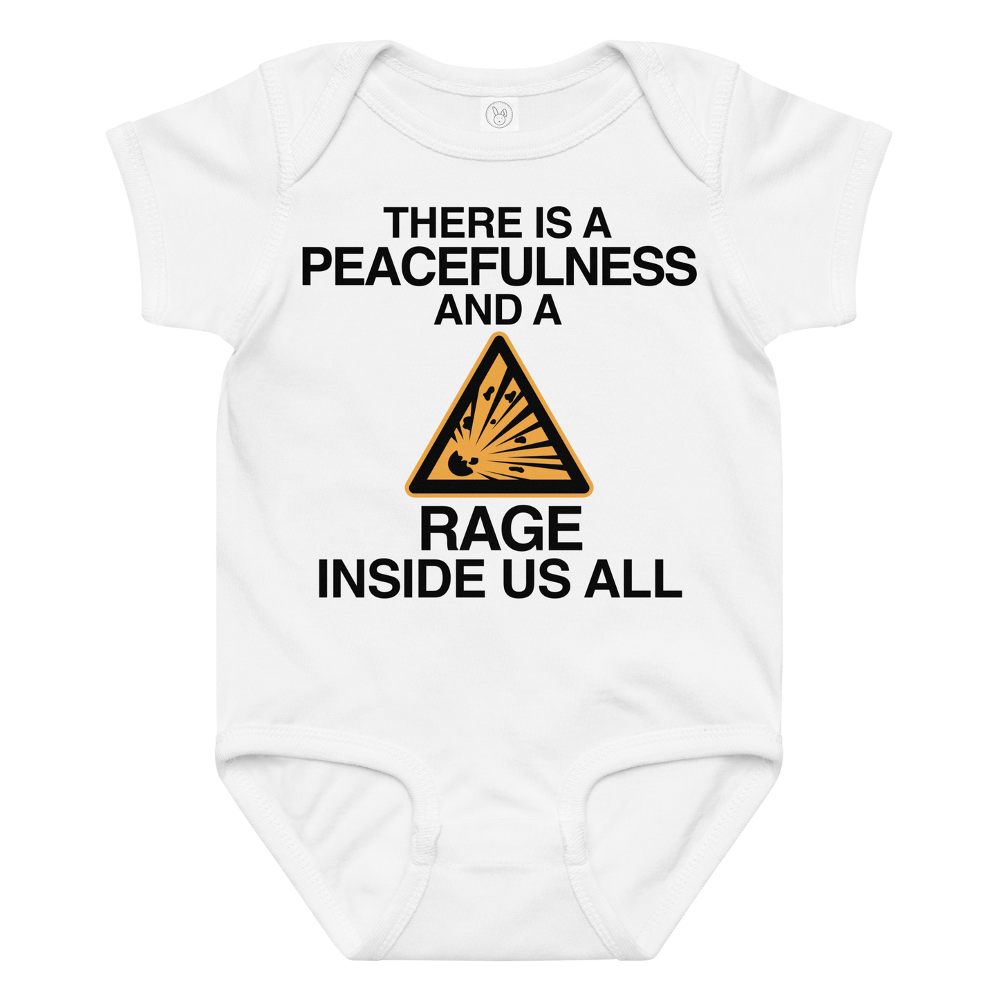 "There is a peacefulness and a rage inside us all" printed on a white baby jersey bodysuit laying on a flat surface amongst other clothes
