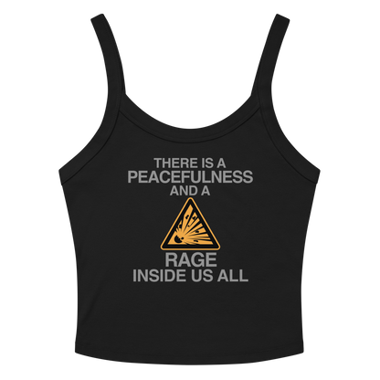 "There is a peacefulness and a rage inside us all" printed on a solid black blend women's micro-rib tanktop laying on a flat surface amongst sunglasses and shorts
