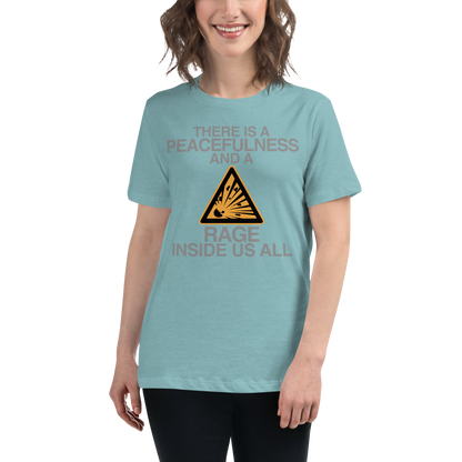 "There is a peacefulness and a rage inside us all" printed on a heather blue lagoon women's relaxed t-shirt worn by a female