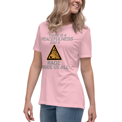 "There is a peacefulness and a rage inside us all" printed on a pink women's relaxed t-shirt worn by a female