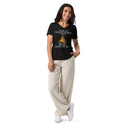 "There is a peacefulness and a rage inside us all" printed on a solid black blend women's relaxed v-neck t-shirt worn by a female