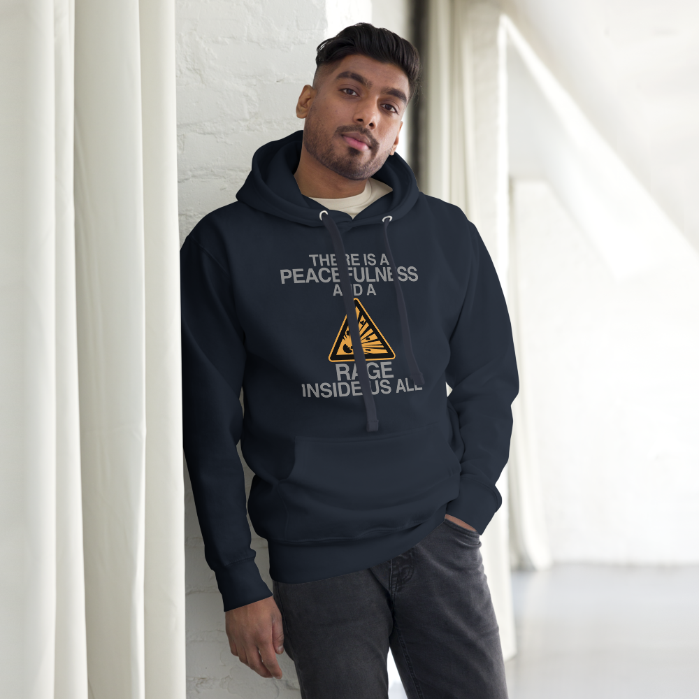 "There is a peacefulness and a rage inside us all" printed on a navy blazer unisex hoodie worn by a male