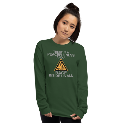 "There is a peacefulness and a rage inside us all" printed on a forest green men's long sleeve shirt worn by a female