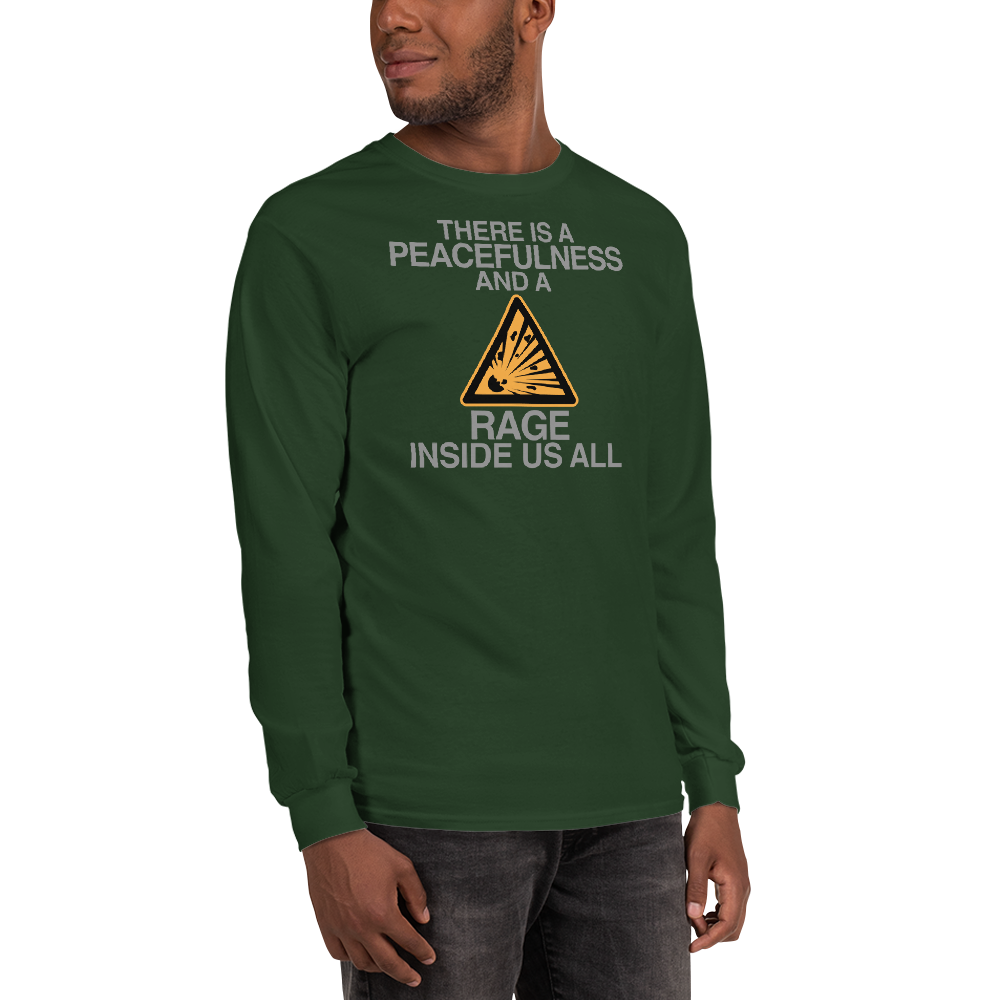 "There is a peacefulness and a rage inside us all" printed on a forest green men's long sleeve shirt worn by a male