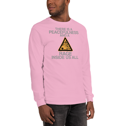 "There is a peacefulness and a rage inside us all" printed on a light pink men's long sleeve shirt worn by a male