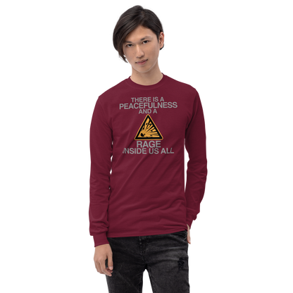 "There is a peacefulness and a rage inside us all" printed on a maroon men's long sleeve shirt worn by a male
