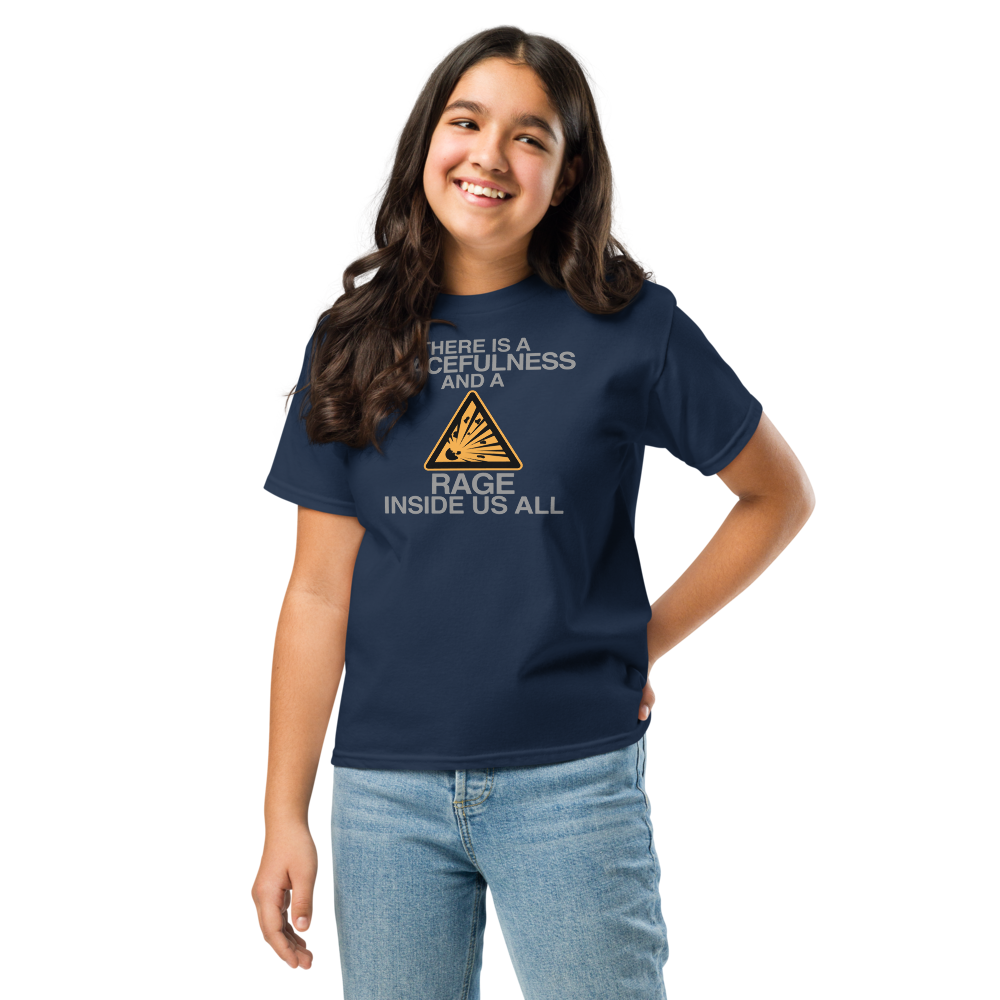 "There is a peacefulness and a rage inside us all" printed on a navy youth classic tee worn by a female