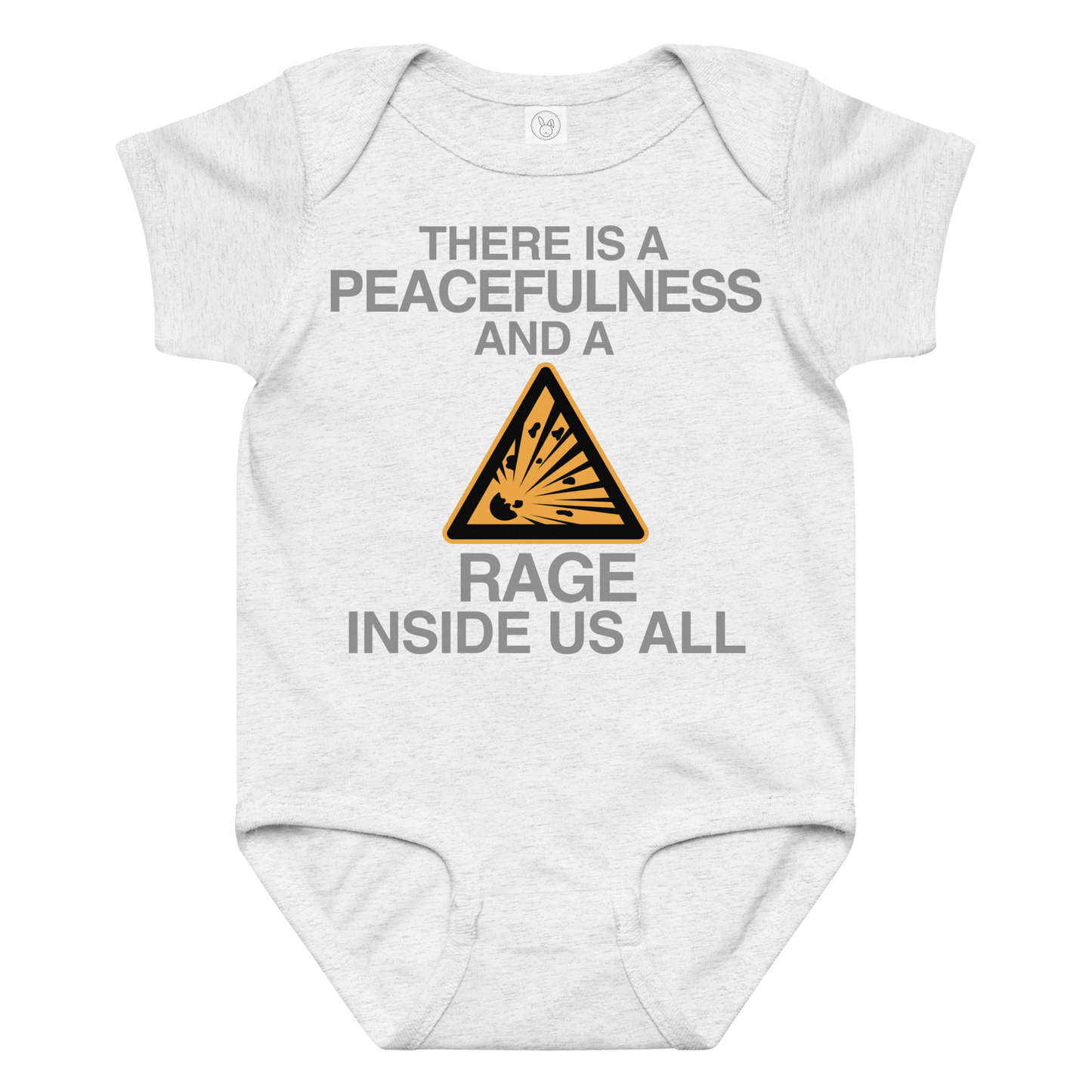 "There is a peacefulness and a rage inside us all" printed on a ash baby jersey bodysuit laying on a flat surface amongst other clothes