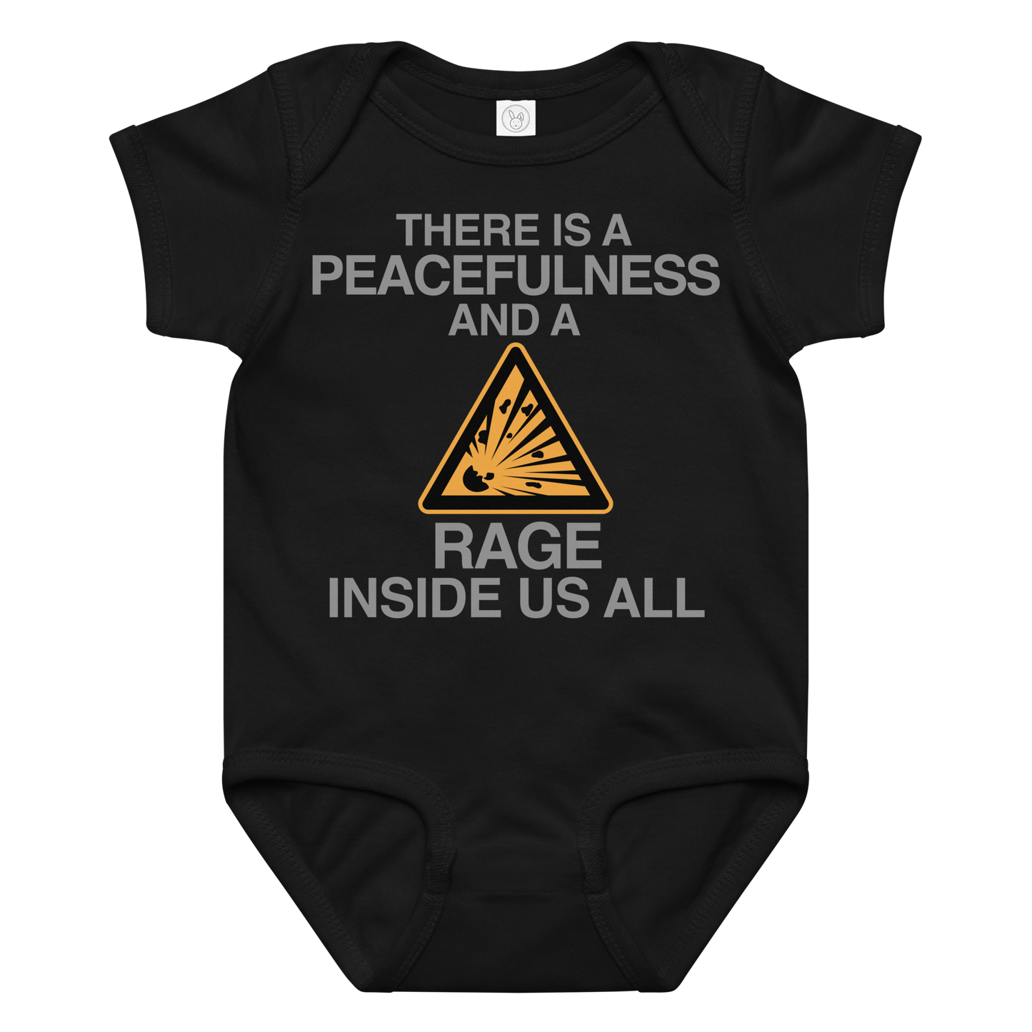 "There is a peacefulness and a rage inside us all" printed on a black baby jersey bodysuit laying on a flat surface amongst other clothes