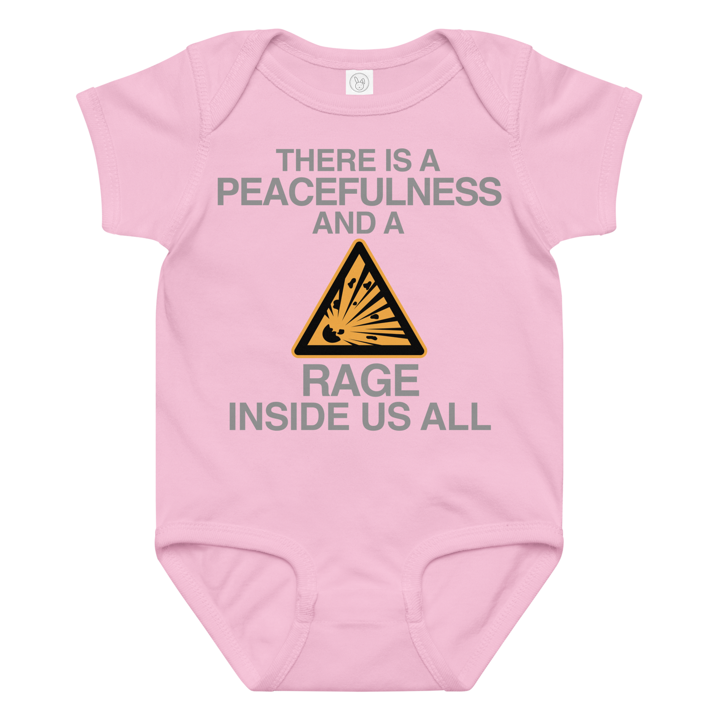 "There is a peacefulness and a rage inside us all" printed on a pink baby jersey bodysuit laying on a flat surface amongst other clothes