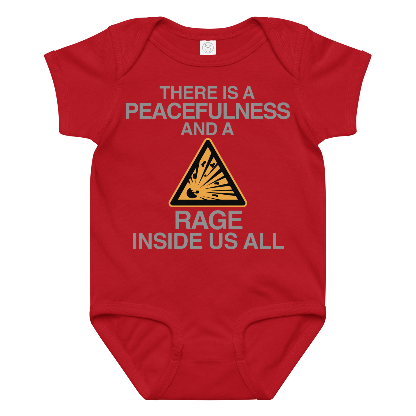 "There is a peacefulness and a rage inside us all" printed on a red baby jersey bodysuit laying on a flat surface amongst other clothes