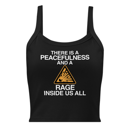 "There is a peacefulness and a rage inside us all" printed on a solid black blend women's micro-rib tanktop laying on a flat surface