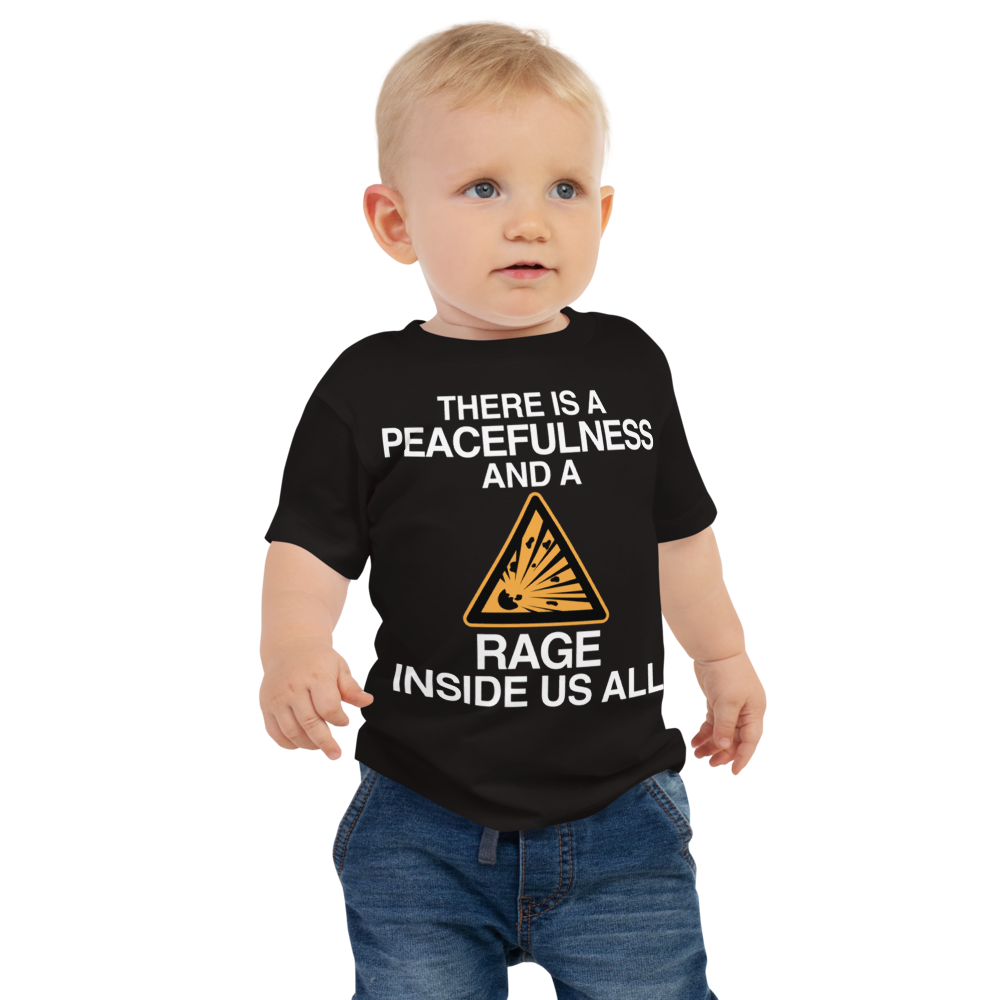 "There is a peacefulness and a rage inside us all" printed on a black baby jersey short sleeve tee worn by a male