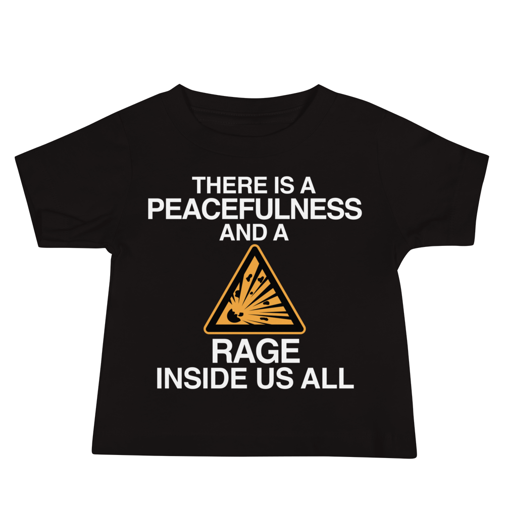 "There is a peacefulness and a rage inside us all" printed on a black baby jersey short sleeve tee laying on a flat surface