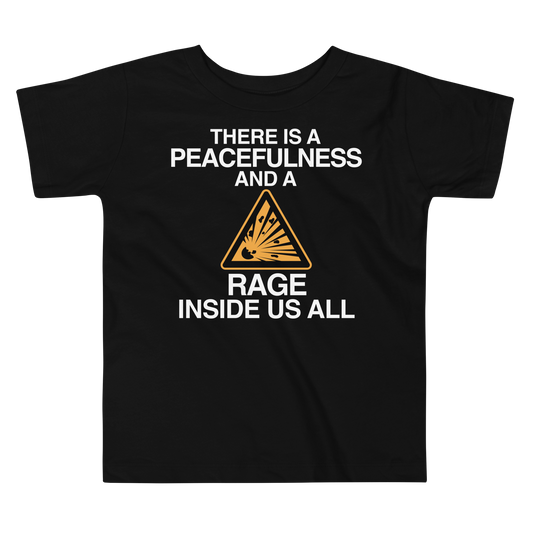 "There is a peacefulness and a rage inside us all" printed on a black toddler short sleeve tee laying on a flat surface