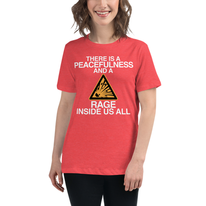 "There is a peacefulness and a rage inside us all" printed on a heather red women's relaxed t-shirt worn by a female