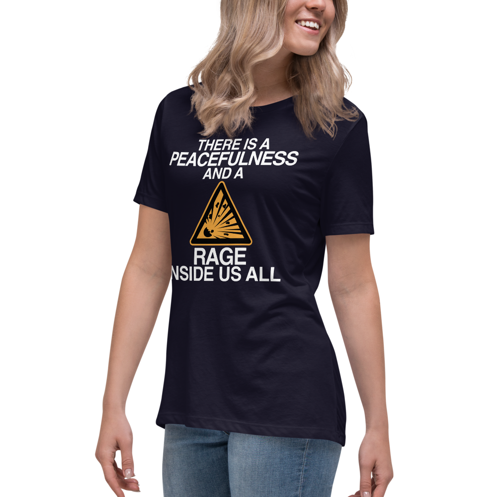 "There is a peacefulness and a rage inside us all" printed on a navy women's relaxed t-shirt worn by a female