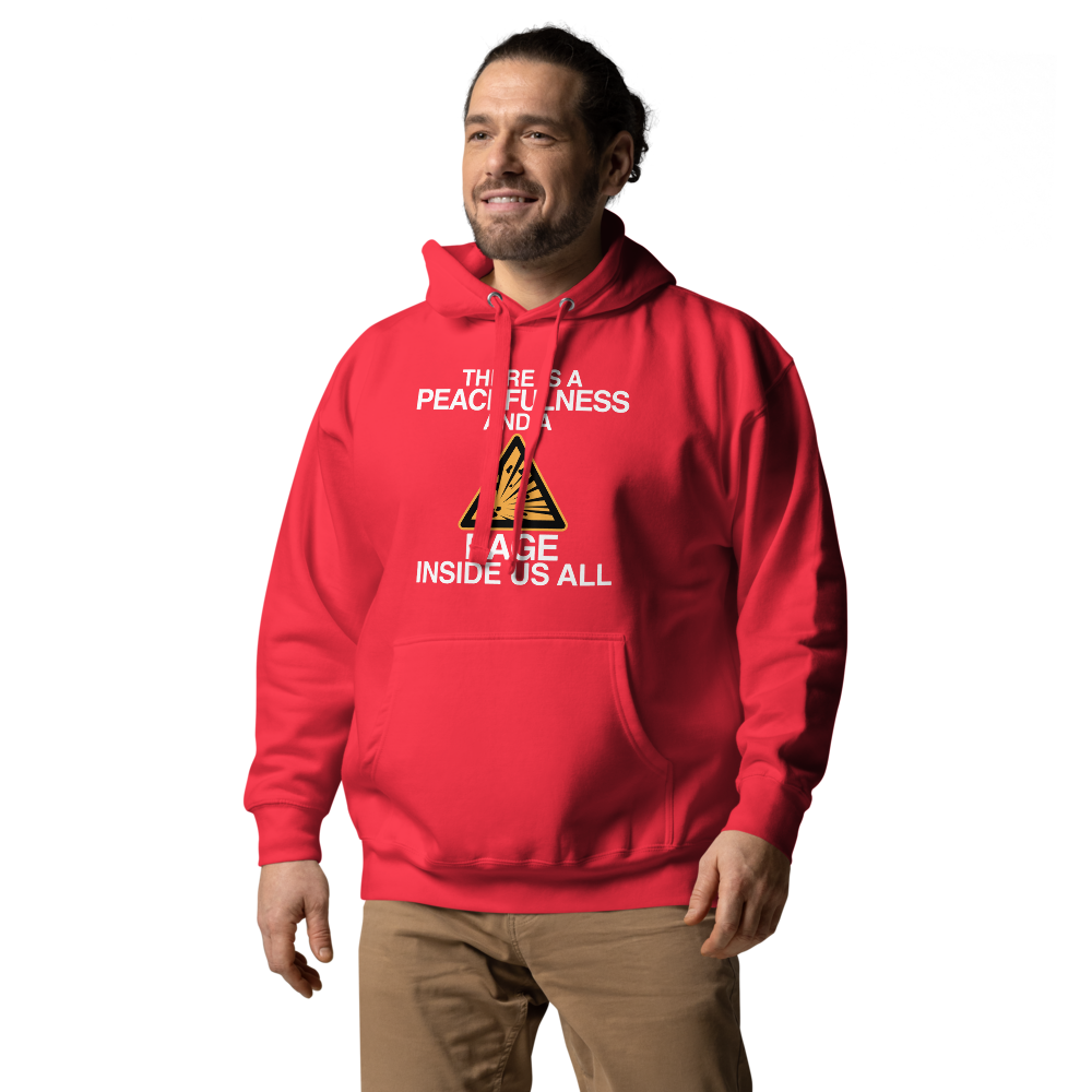 "There is a peacefulness and a rage inside us all" printed on a team red unisex hoodie worn by a male