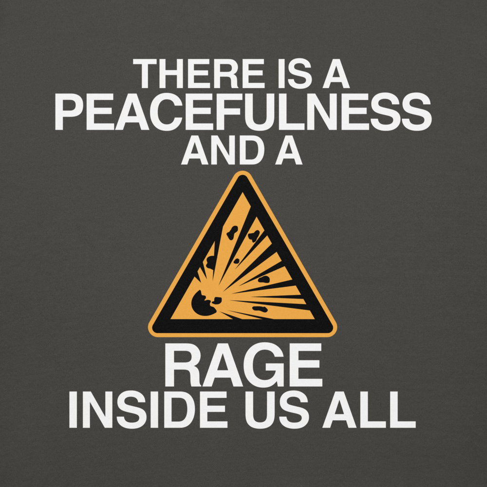 "There is a peacefulness and a rage inside us all" printed on a vintage black background