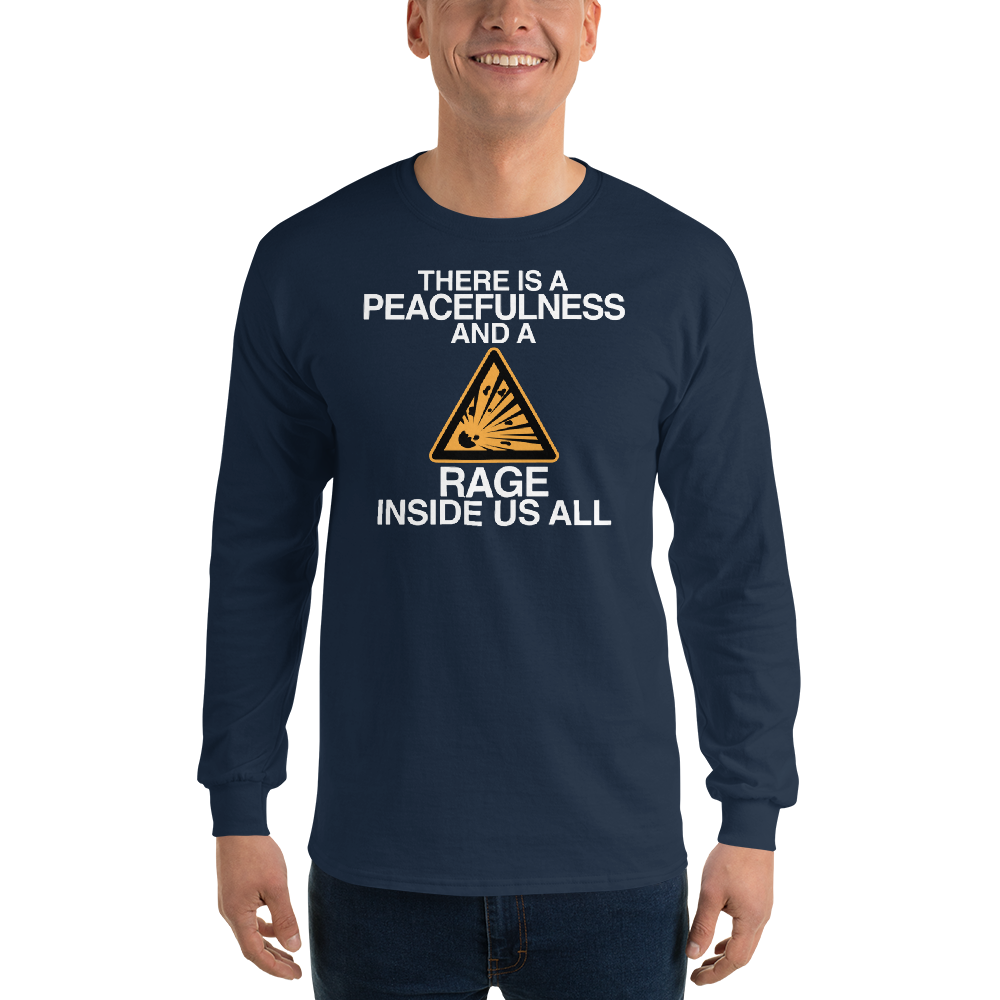 "There is a peacefulness and a rage inside us all" printed on a navy men's long sleeve shirt worn by a male