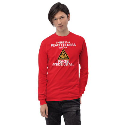 "There is a peacefulness and a rage inside us all" printed on a red men's long sleeve shirt worn by a male