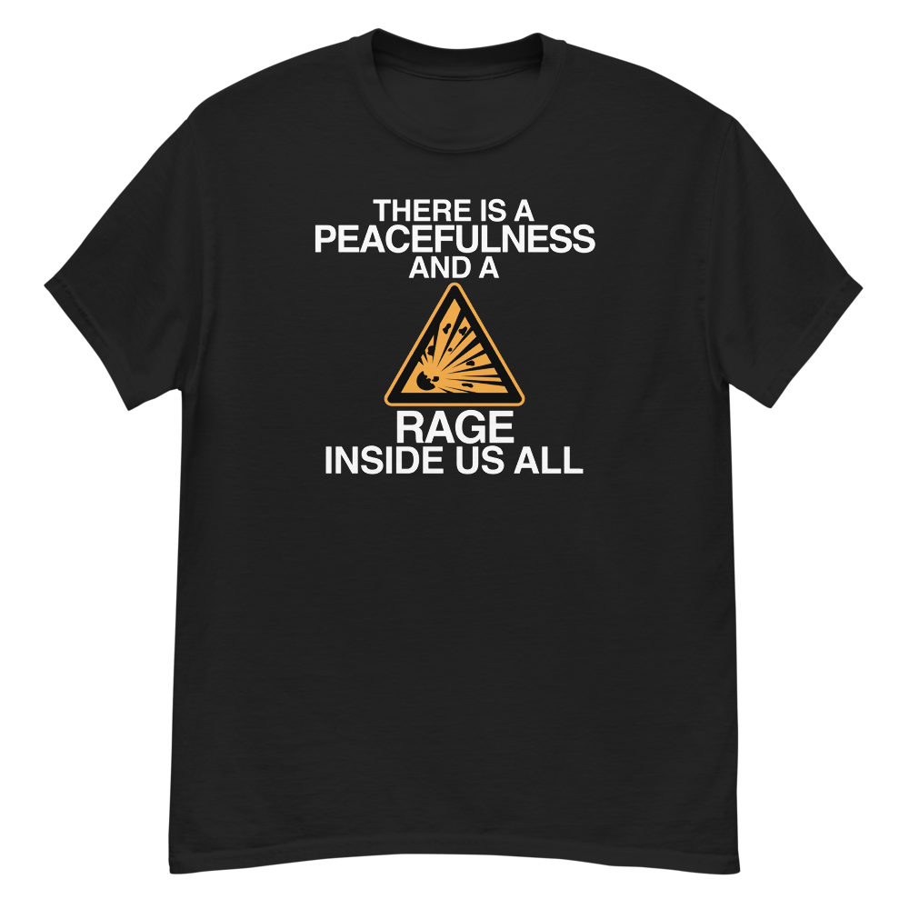 "There is a peacefulness and a rage inside us all" printed on a black unisex classic tee laying on a flat surface