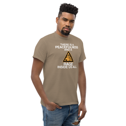 "There is a peacefulness and a rage inside us all" printed on a brown savana unisex classic tee worn by a male