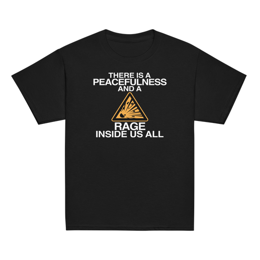 "There is a peacefulness and a rage inside us all" printed on a black youth classic tee laying on a flat surface