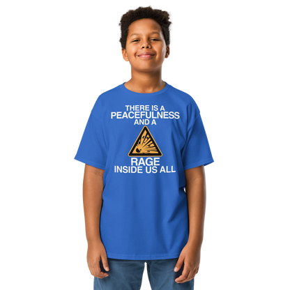 "There is a peacefulness and a rage inside us all" printed on a royal youth classic tee worn by a male