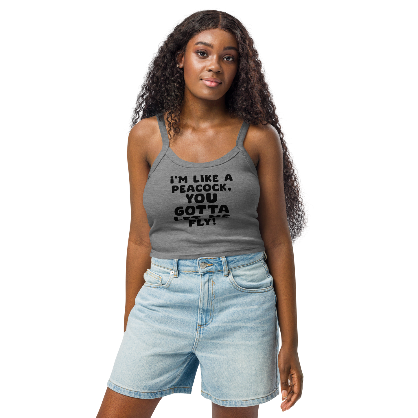 "I'm like a peacock, you gotta let me fly!" printed on a athletic heather women's micro-rib tanktop worn by a female