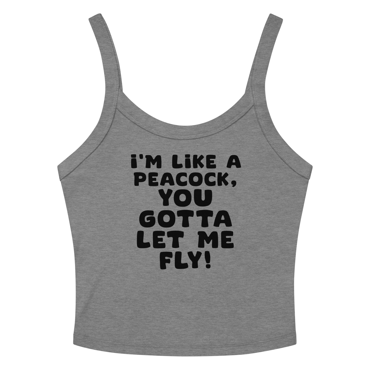 "I'm like a peacock, you gotta let me fly!" printed on a athletic heather women's micro-rib tanktop laying on a flat surface amongst sunglasses and shorts