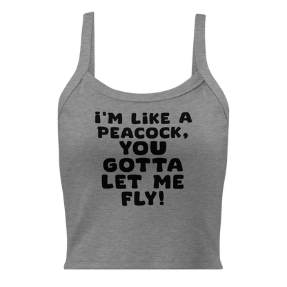 "I'm like a peacock, you gotta let me fly!" printed on a athletic heather women's micro-rib tanktop laying on a flat surface