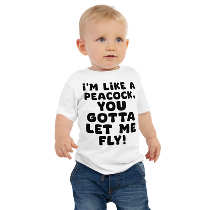 "I'm like a peacock, you gotta let me fly!" printed on a white baby jersey short sleeve tee worn by a male