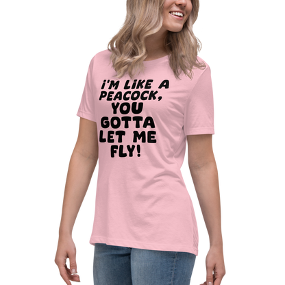 "I'm like a peacock, you gotta let me fly!" printed on a pink women's relaxed t-shirt worn by a female