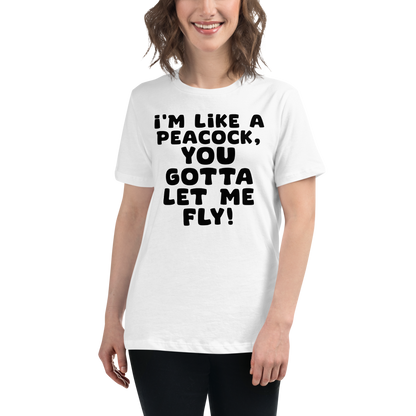 "I'm like a peacock, you gotta let me fly!" printed on a white women's relaxed t-shirt worn by a female
