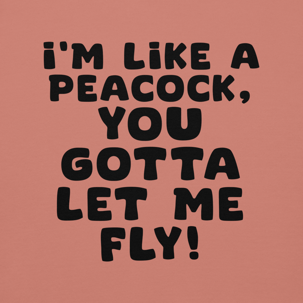 "I'm like a peacock, you gotta let me fly!" printed on a dusty rose background