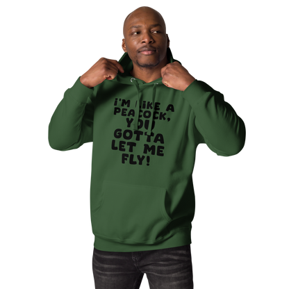 "I'm like a peacock, you gotta let me fly!" printed on a forest green unisex hoodie worn by a male