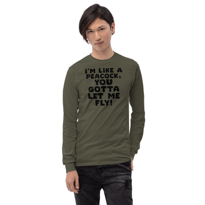 "I'm like a peacock, you gotta let me fly!" printed on a military green men's long sleeve shirt worn by a male